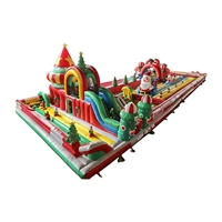 Château gonflable géant de Noël avec toboggan et luge de Père Noël, combo de château gonflable pour l'intérieur et l'extérieur