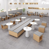 Ensemble de chaises et tables commerciales en cuir et bois massif de style nordique moderne pour salon, restaurant, café, salon de thé et pâtisserie