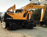 Excavatrice sur pneus fiable de 210 WS pour la construction urbaine, l'entretien routier, l'installation de canalisations, l'aménagement paysager et la manutention de matériaux