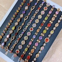 Bracelet en cuivre plaqué or en gros, serti de micro-diamants VVS Zircon, style Ice Out, avec breloque œil baguette pour femme