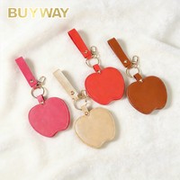 Miroir de poche tendance en forme de pomme avec logo personnalisé, porte-clés en cuir PU, miroir de maquillage compact pour femmes et filles, cadeau promotionnel