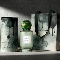 Flacon de parfum cylindrique vert clair très demandé, avec bouchon en verre tourbillonnant en option ou pompe pulvérisatrice argentée, logo et boîte personnalisables