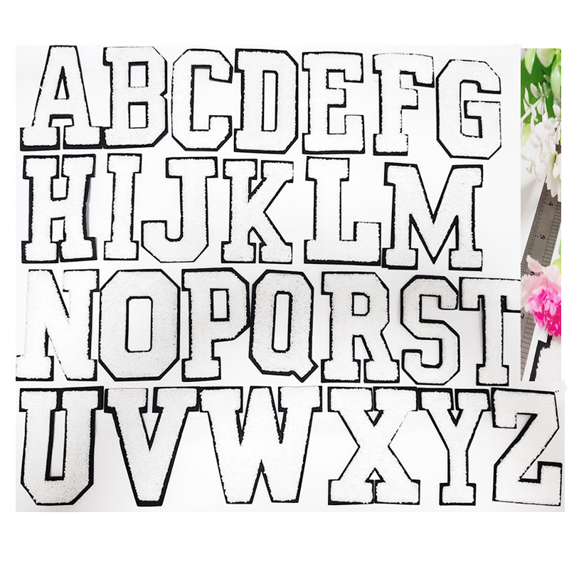 Blanc avec bordure noire (7 cm, prix par lettre unique)