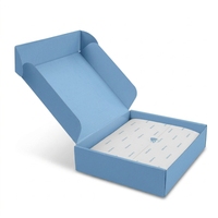 Boîte d'expédition en carton ondulé bleu gaufré, imperméable, avec logo personnalisé imprimé, papier de soie personnalisé et fermeture magnétique pour l'expédition de boutiques