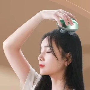 เครื่องนวดศีรษะแบบพกพา กันน้ำ พร้อมฟังก์ชั่นดนตรี นวดคลายความเครียด สำหรับใช้ในบ้านและนอกบ้าน - Product Image 1