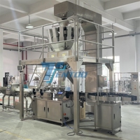 Machine automatique de pesage, de remplissage, de scellage et d'emballage pour granulés, bouteilles, chanvre, chocolat, pignons de pin, grains de café