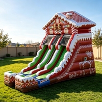 Château gonflable de Noël personnalisé en forme de maison de pain d'épices avec double toboggan