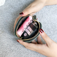 Nouveau simple rétro mini porte-monnaie en peau de vache petit portefeuille femmes en cuir véritable boulette fermeture éclair sac à monnaie