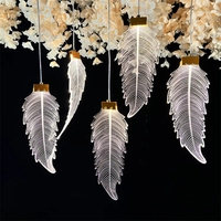 Nouveauté : Lustre LED en forme de plume à 5 têtes, lampe suspendue en acrylique transparent pour la décoration de la maison, des mariages et des plafonds