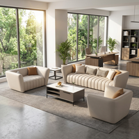Ensemble de canapés de bureau côtelés crème, mobilier de salon chic pour espaces ouverts avec design vue sur verdure naturelle fraîche