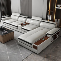 Ensemble de canapés en cuir synthétique moderne et personnalisé 2025, gain de place, fonction massage, forme en L, pieds en métal pour salon de villa