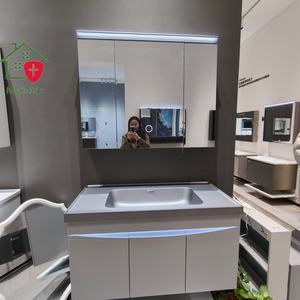 Nouvelle armoire de salle de bain blanche avec corps de meuble à trois portes et lavabo gris sur comptoir. - Product Image 5