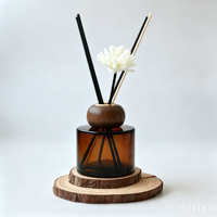 Diffuseur de parfum en verre ambré rond personnalisé de 100 ml et 120 ml pour hôtel