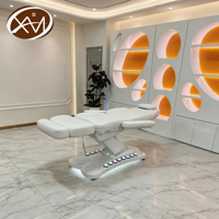 Table de massage électrique réglable et pliable de luxe pour salon de beauté et salle de sport, avec fonctionnalités d'extension de cils et de soins du visage