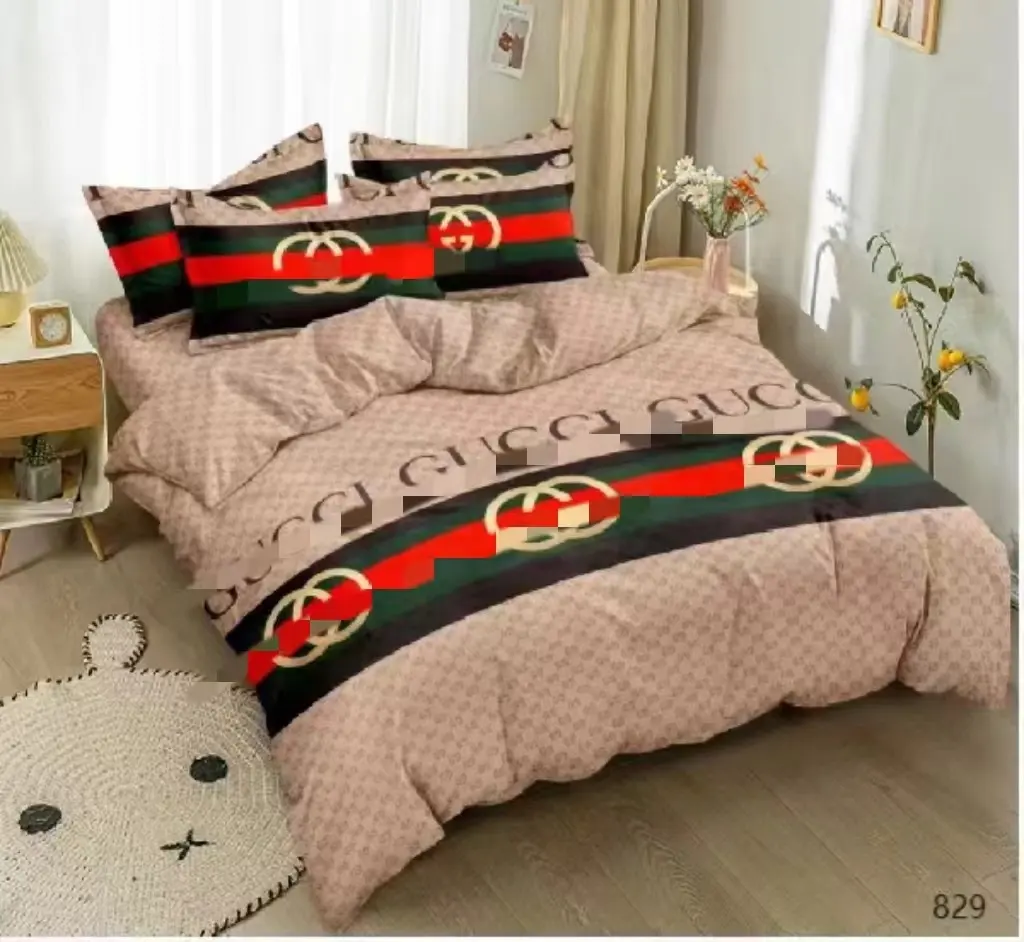 China fabrica al por mayor marca de diseño funda nórdica de algodón juego de cama de lujo sábanas king size juego de cama