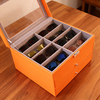 Caja expositora de gafas de cuero PU naranja, negro y verde con 24 ranuras y 2 cajones, nueva, al por mayor