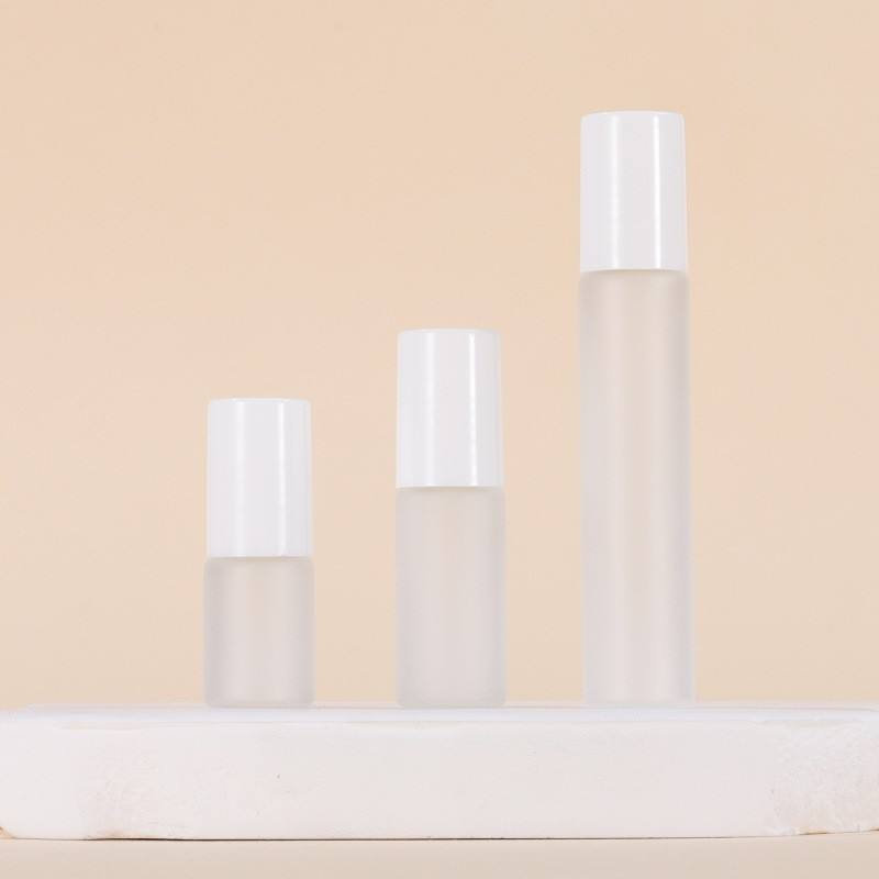 Frosted bottle + Steel roller ball + Plastic white cap