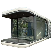 Maison mobile de luxe Capsule spatiale Suite de luxe Mur de verre Petite maison Belle chambre Usine de Chine Maison intelligente Chambre de vacances Scénique
