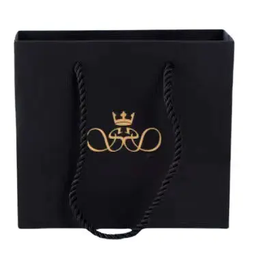 Logo personnalisé noir luxe feuille d'or estampage Shopping cadeau sac en papier avec poignée pour vêtements chaussures bijoux cosmétiques