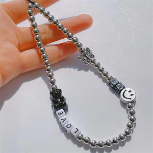 Portátil negro blanco oso cara sonriente con cuentas teléfono móvil cadena encanto mujeres niñas teléfono móvil decoración cordón correa de teléfono - Product Image 2