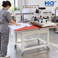 Gemakkelijk te bedienen, betrouwbare pneumatische dubbelstation warmtepersmachine voor het bedrukken van T-shirts, kleding en kledingproductie.