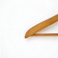 Cintre en bois naturel de haute qualité, écologique, avec crochet chromé et barre à pantalons, design minimaliste et gain de place, pour magasins de vêtements (vente en gros)