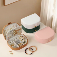 Haut de gamme rétro bijoux organisateur cas stockage bijoux coffret cadeau en cuir voyage coquille boîte à bijoux pour boucles d'oreilles bagues collier