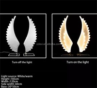Lampe sur pied LED moderne de luxe en métal doré avec ailes d'ange et fleurs, design écologique, haute qualité, pour la décoration de toile de fond de mariage