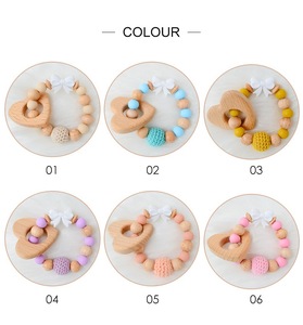 Haute qualité Crochet bébé doux Silicone perles arc <span class=keywords><strong>anneau</strong></span> <span class=keywords><strong>de</strong></span> <span class=keywords><strong>dentition</strong></span> Bracelet jouets nouveau-né hêtre naturel en <span class=keywords><strong>bois</strong></span> en forme <span class=keywords><strong>de</strong></span> coeur <span class=keywords><strong>anneau</strong></span> <span class=keywords><strong>de</strong></span> <span class=keywords><strong>dentition</strong></span> - Product Image 2