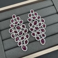 Ensemble de bijoux en cuivre plaqué or de luxe chic inspiré des designers Honggang avec détails en zircon exquis