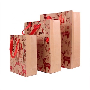 Recycled Kraft Paper Christmas Gift Bags with Flexiloop Handles and Embossing - Product Image 1