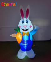 Décor gonflable de lapin de Pâques avec des carottes pour le printemps, la pelouse extérieure et le jardin