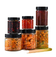 Emballage de pot de bouteille rond grands pots ronds clairs en verre avec couvercles noirs pour le stockage pot de miel alimentaire pour emballage alimentaire en conserve