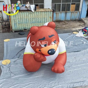 Mascotte gonflable géante en forme d'ours brun allongé avec ventilateur intégré et dimensions personnalisées pour les expositions dans les centres commerciaux - Product Image 3