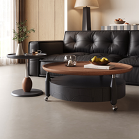 Table de cocktail ronde noire contemporaine avec roulettes pour hôtel et salon