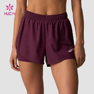 HUCAI Vêtements de sport personnalisés Respirant Cordon de serrage Léger Séchage rapide Double couche 2 en 1 Shorts de sport de course à pied pour femmes - Product Image 1