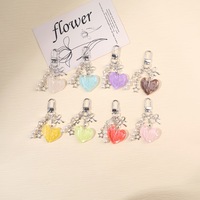 Porte-clés Cœur Étoile Argenté Style Ins avec Nœud Papillon – Pendentif de Sac Simple et Polyvalent