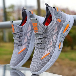 Zapatillas de correr ligeras de malla para hombre, transpirables, con suela suave, para entrenamiento deportivo, con cordones, diseño gris y naranja - Product Image 1