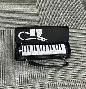 Melódica al por mayor de fábrica, 32/37 teclas, logotipo personalizado, instrumento musical de viento con caja de regalo para distribuidores escolares - Product Image 5