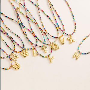 Collier perlé pour femme en acier inoxydable plaqué or 18 carats, avec pendentif lettre, chaînes fines, style Bohème, sans perte de perles - Product Image 1