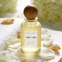 Flacons de parfum personnalisés en direct d'usine 30ml/50ml/100ml avec bouchon en verre givré et pulvérisateur à pompe doré, design luxueux