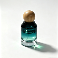 Nouveaux flacons de parfum design 50ml, vert dégradé, épaule inclinée, atomiseur rechargeable, emballage en verre avec couvercle en bois