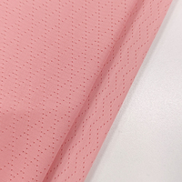 Vêtements de sport Dry Fit 90%P 10%SP Tissu respirant extensible à l'aspect nid d'abeille