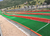 Terrain de jeu en pente sèche artificielle d'usine tapis de ski en plastique imbriqué toboggan arc-en-ciel aire de jeux carreaux de sol de ski