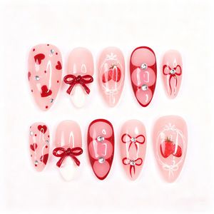 Uñas postizas <span class=keywords><strong>de</strong></span> almendra estilo coquette <span class=keywords><strong>de</strong></span> San Valentín con lazo rojo, fresa y corazón <span class=keywords><strong>de</strong></span> diamantes <span class=keywords><strong>de</strong></span> imitación, uñas <span class=keywords><strong>de</strong></span> gel para adolescentes, venta al por mayor - Product Image 1