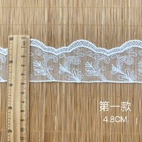 Tissu de vêtements ondulé élégant en dentelle brodée de filament de polyester soluble dans l'eau et accessoires de mode à la maison pour chaussures et sacs