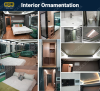 Capsule hôtelière mobile préfabriquée de luxe moderne et durable en forme de vaisseau spatial, avec salle de bain, cuisine et appartement en acier