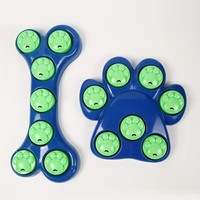 Gamelle interactive en silicone pour chien, forme d'os, pour distribution lente de friandises, jeu de cache-cache amusant, design tendance et ludique