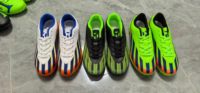 Stock de liquidation Chaussures de football TF pour enfants Crampons de football pour terrain synthétique Couleurs mélangées pour la revente