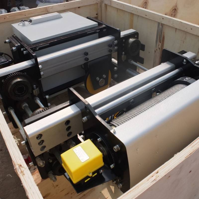 Close-up view of the NR hoist's compact motor and gearbox assembly.